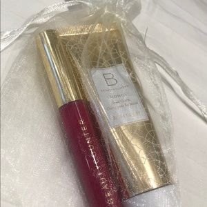 Brand new lip gloss/hand cream set with gift bag!